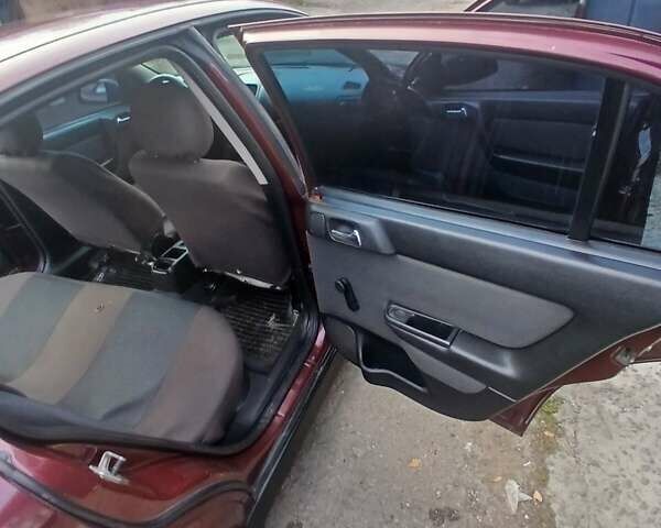 Червоний Опель Астра, об'ємом двигуна 1.4 л та пробігом 247 тис. км за 2300 $, фото 35 на Automoto.ua