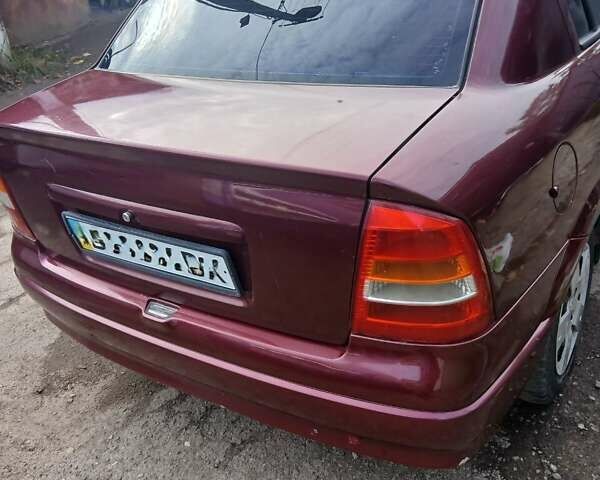 Червоний Опель Астра, об'ємом двигуна 1.4 л та пробігом 247 тис. км за 2300 $, фото 3 на Automoto.ua