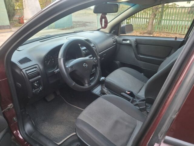 Червоний Опель Астра, об'ємом двигуна 1 л та пробігом 230 тис. км за 4000 $, фото 5 на Automoto.ua