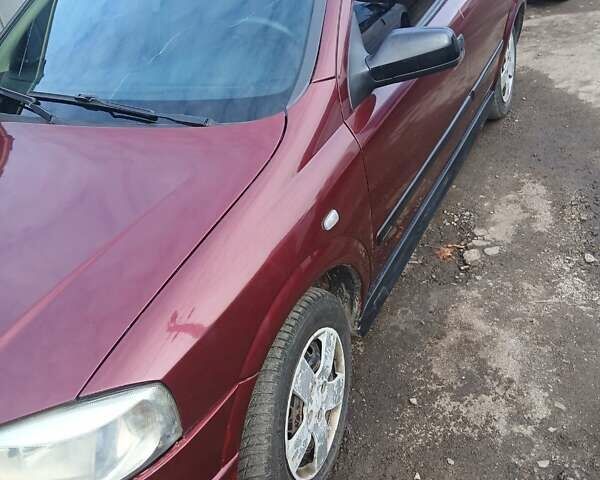 Червоний Опель Астра, об'ємом двигуна 1.4 л та пробігом 247 тис. км за 2300 $, фото 6 на Automoto.ua