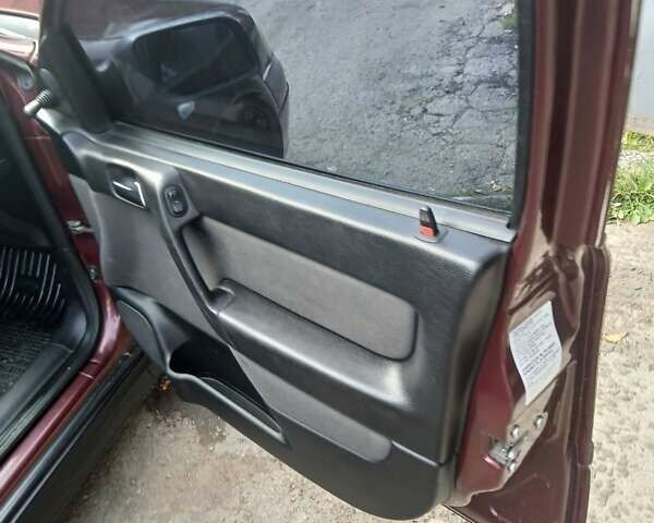 Червоний Опель Астра, об'ємом двигуна 1.4 л та пробігом 247 тис. км за 2300 $, фото 14 на Automoto.ua