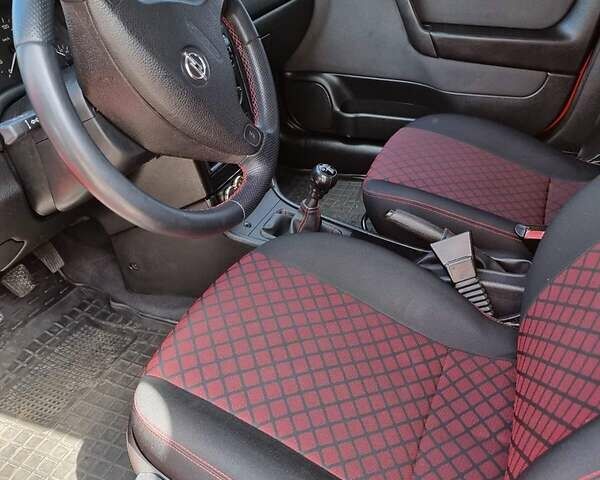 Красный Опель Астра, объемом двигателя 1.6 л и пробегом 224 тыс. км за 4500 $, фото 6 на Automoto.ua