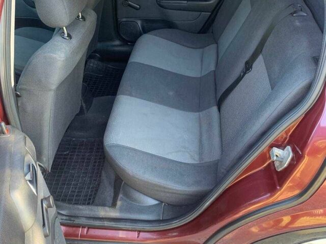 Красный Опель Астра, объемом двигателя 1.6 л и пробегом 285 тыс. км за 3000 $, фото 12 на Automoto.ua