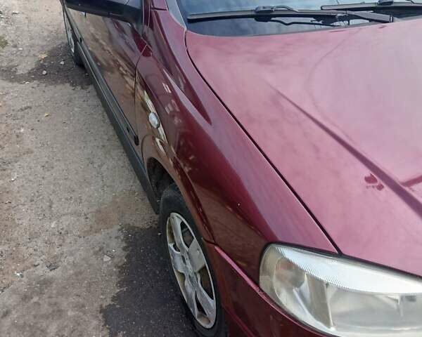 Червоний Опель Астра, об'ємом двигуна 1.4 л та пробігом 247 тис. км за 2300 $, фото 39 на Automoto.ua