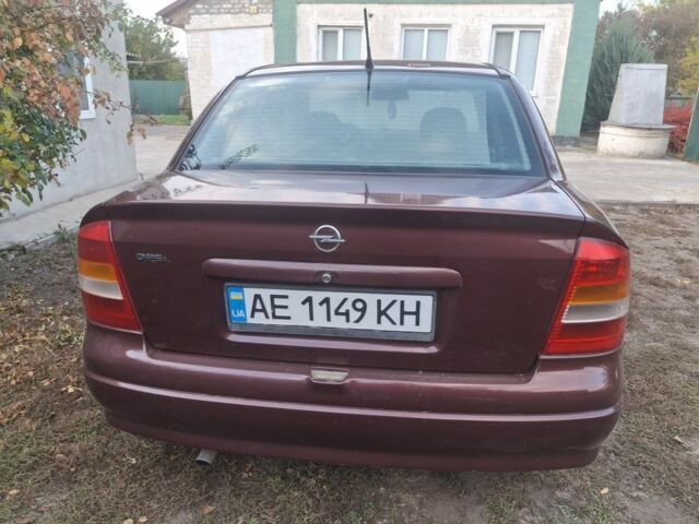 Червоний Опель Астра, об'ємом двигуна 1 л та пробігом 230 тис. км за 4000 $, фото 4 на Automoto.ua