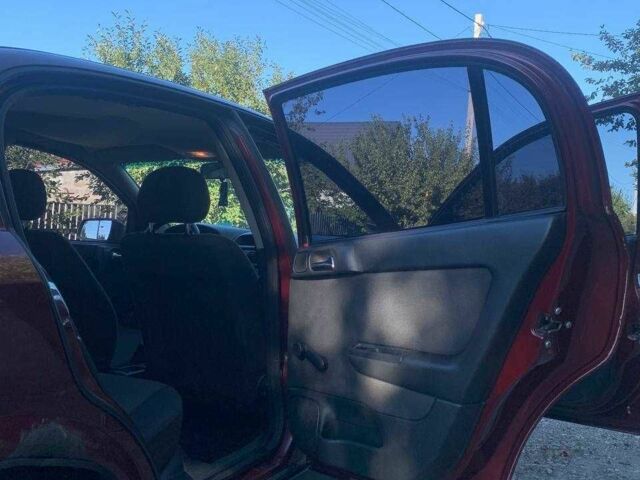 Красный Опель Астра, объемом двигателя 1.6 л и пробегом 285 тыс. км за 3000 $, фото 18 на Automoto.ua