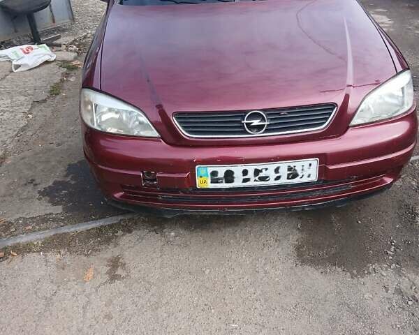 Червоний Опель Астра, об'ємом двигуна 1.4 л та пробігом 247 тис. км за 2300 $, фото 10 на Automoto.ua