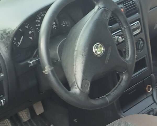 Червоний Опель Астра, об'ємом двигуна 1.4 л та пробігом 247 тис. км за 2300 $, фото 33 на Automoto.ua