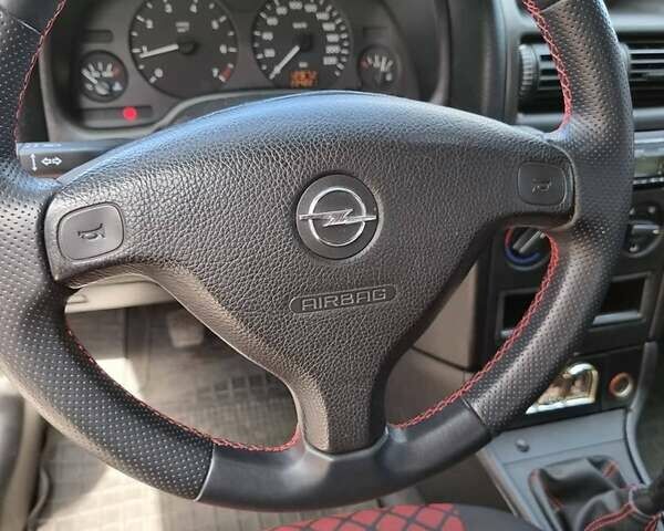 Красный Опель Астра, объемом двигателя 1.6 л и пробегом 224 тыс. км за 4500 $, фото 5 на Automoto.ua