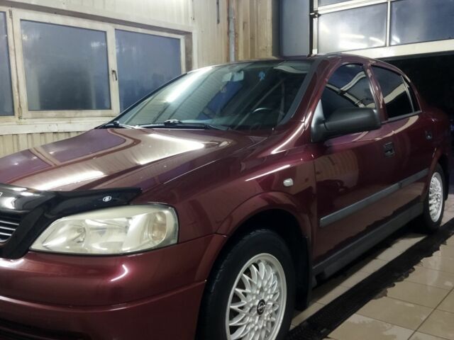 Красный Опель Астра, объемом двигателя 1.4 л и пробегом 420 тыс. км за 3200 $, фото 5 на Automoto.ua