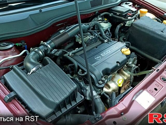 Червоний Опель Астра, об'ємом двигуна 1.4 л та пробігом 143 тис. км за 3650 $, фото 7 на Automoto.ua