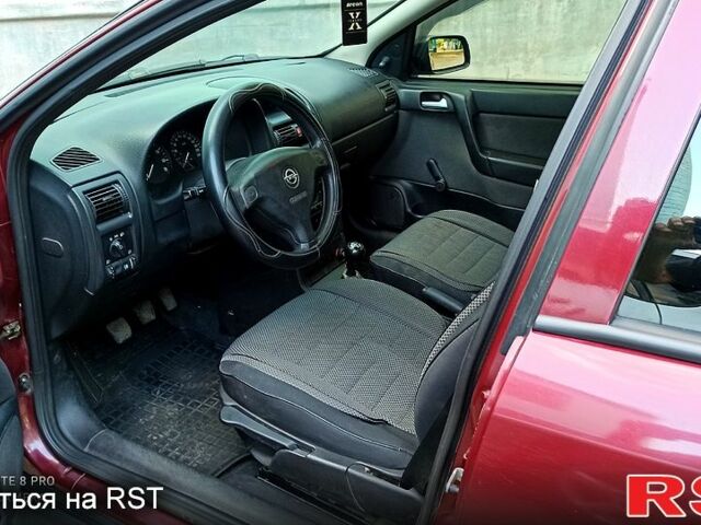 Червоний Опель Астра, об'ємом двигуна 1.4 л та пробігом 143 тис. км за 3650 $, фото 5 на Automoto.ua