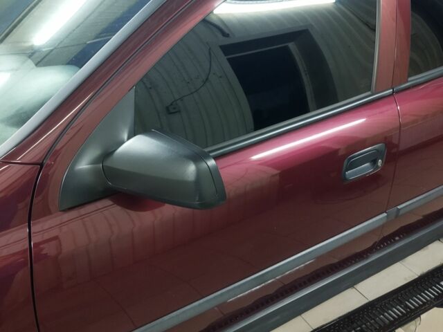 Красный Опель Астра, объемом двигателя 1.4 л и пробегом 420 тыс. км за 3200 $, фото 6 на Automoto.ua