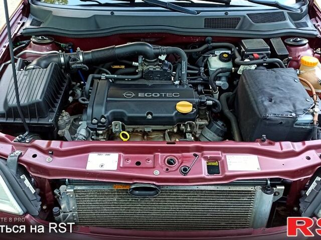 Червоний Опель Астра, об'ємом двигуна 1.4 л та пробігом 143 тис. км за 3650 $, фото 1 на Automoto.ua