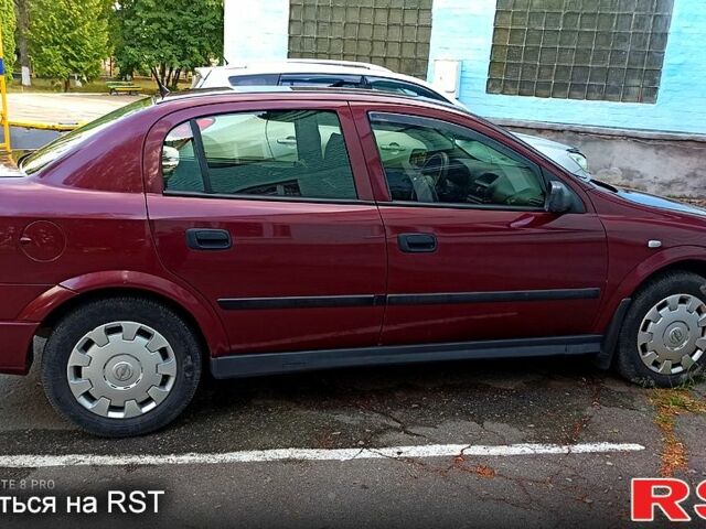 Червоний Опель Астра, об'ємом двигуна 1.4 л та пробігом 143 тис. км за 3650 $, фото 8 на Automoto.ua