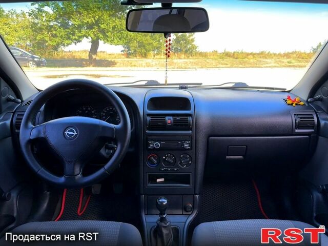 Опель Астра 2006 в Новом Буге на Automoto.ua Красный Опель Астра, объемом двигателя 1.4 л и пробегом 195 тыс. км за 4200 $, фото 10 на Automoto.ua