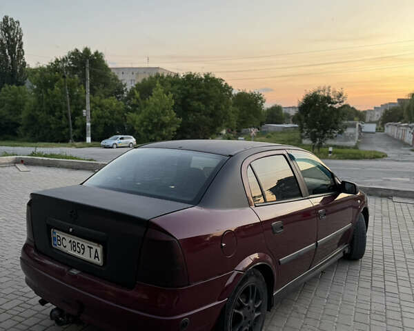 Червоний Опель Астра, об'ємом двигуна 1.4 л та пробігом 380 тис. км за 2850 $, фото 8 на Automoto.ua