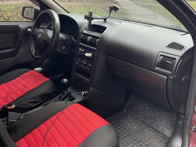 Червоний Опель Астра, об'ємом двигуна 1.4 л та пробігом 208 тис. км за 3600 $, фото 6 на Automoto.ua