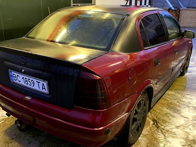 Красный Опель Астра, объемом двигателя 1.4 л и пробегом 313 тыс. км за 3800 $, фото 1 на Automoto.ua