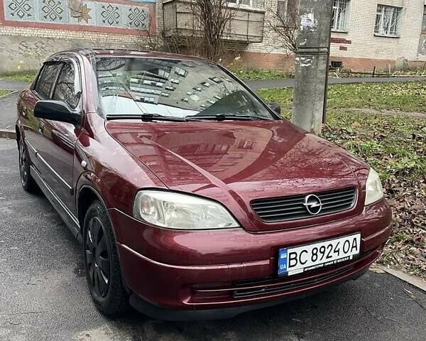 Червоний Опель Астра, об'ємом двигуна 1.4 л та пробігом 208 тис. км за 3600 $, фото 7 на Automoto.ua