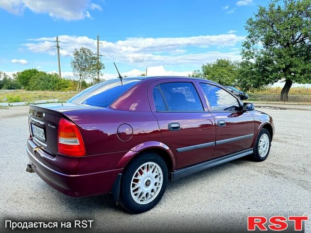 Опель Астра 2006 в Новом Буге на Automoto.ua Красный Опель Астра, объемом двигателя 1.4 л и пробегом 195 тыс. км за 4200 $, фото 5 на Automoto.ua