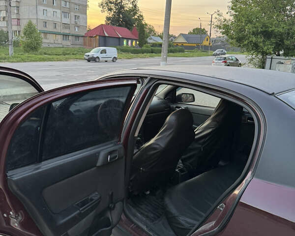 Червоний Опель Астра, об'ємом двигуна 1.4 л та пробігом 380 тис. км за 2850 $, фото 13 на Automoto.ua