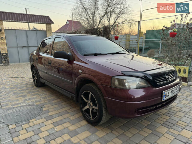 Червоний Опель Астра, об'ємом двигуна 1.4 л та пробігом 206 тис. км за 3500 $, фото 5 на Automoto.ua
