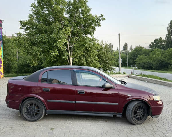Червоний Опель Астра, об'ємом двигуна 1.4 л та пробігом 380 тис. км за 2850 $, фото 10 на Automoto.ua
