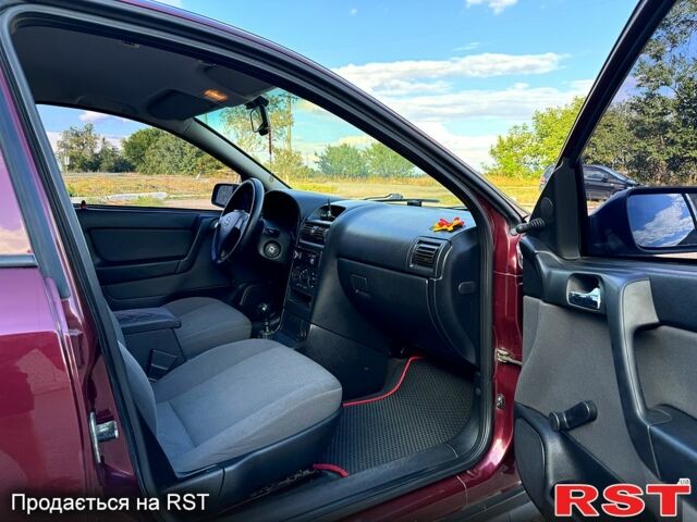 Опель Астра 2006 в Новом Буге на Automoto.ua Красный Опель Астра, объемом двигателя 1.4 л и пробегом 195 тыс. км за 4200 $, фото 11 на Automoto.ua