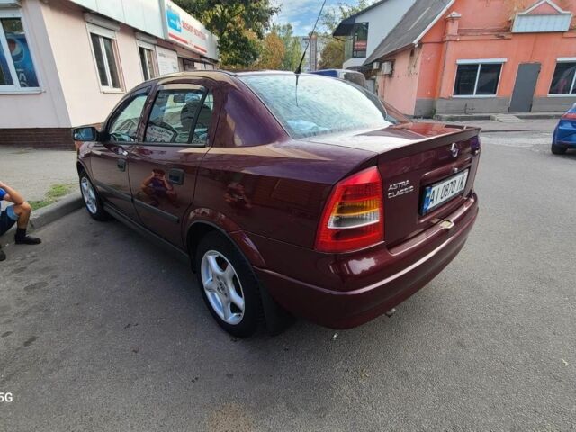 Красный Опель Астра, объемом двигателя 1.4 л и пробегом 226 тыс. км за 4500 $, фото 6 на Automoto.ua