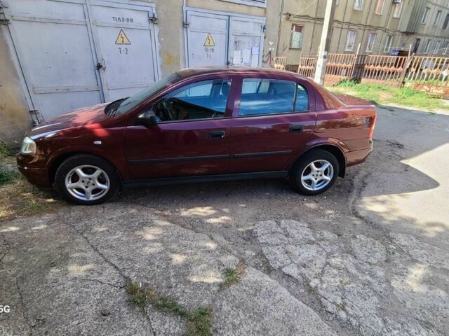 Красный Опель Астра, объемом двигателя 1.4 л и пробегом 226 тыс. км за 4500 $, фото 11 на Automoto.ua