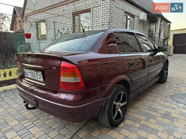 Червоний Опель Астра, об'ємом двигуна 1.4 л та пробігом 206 тис. км за 3500 $, фото 4 на Automoto.ua