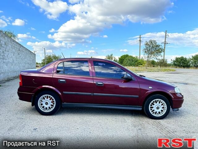 Опель Астра 2006 в Новом Буге на Automoto.ua Красный Опель Астра, объемом двигателя 1.4 л и пробегом 195 тыс. км за 4200 $, фото 6 на Automoto.ua