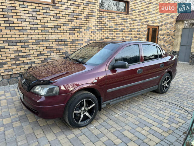 Червоний Опель Астра, об'ємом двигуна 1.4 л та пробігом 206 тис. км за 3500 $, фото 1 на Automoto.ua