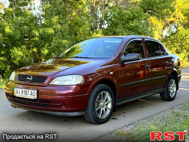 Червоний Опель Астра, об'ємом двигуна 1.4 л та пробігом 180 тис. км за 4000 $, фото 2 на Automoto.ua