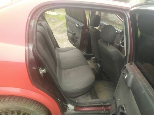 Червоний Опель Астра, об'ємом двигуна 1.4 л та пробігом 267 тис. км за 2200 $, фото 6 на Automoto.ua