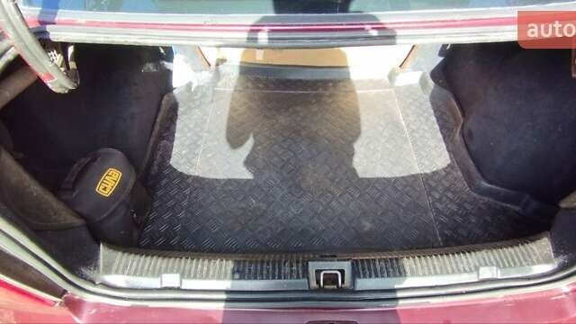 Красный Опель Астра, объемом двигателя 1.4 л и пробегом 297 тыс. км за 2500 $, фото 7 на Automoto.ua