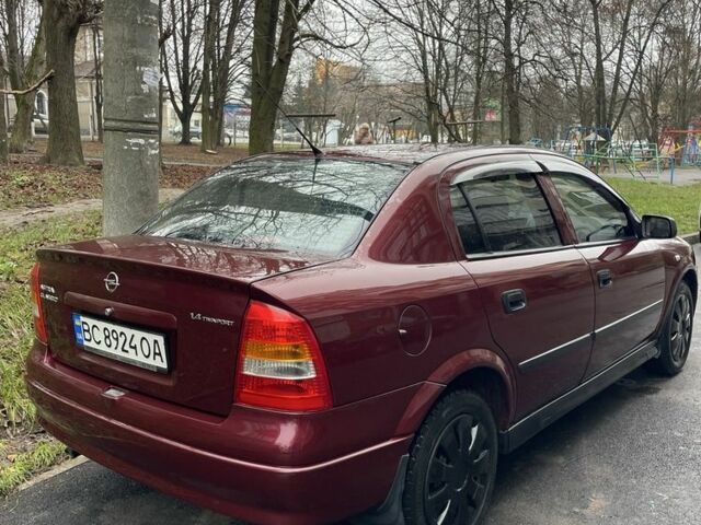 Червоний Опель Астра, об'ємом двигуна 1.4 л та пробігом 208 тис. км за 3600 $, фото 3 на Automoto.ua