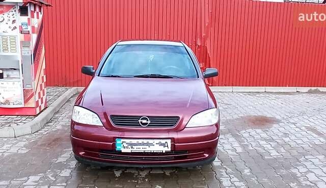 Червоний Опель Астра, об'ємом двигуна 1.4 л та пробігом 207 тис. км за 2500 $, фото 2 на Automoto.ua