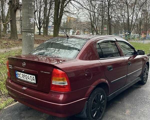 Червоний Опель Астра, об'ємом двигуна 1.4 л та пробігом 208 тис. км за 3600 $, фото 2 на Automoto.ua