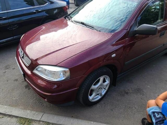 Красный Опель Астра, объемом двигателя 1.4 л и пробегом 226 тыс. км за 4500 $, фото 10 на Automoto.ua