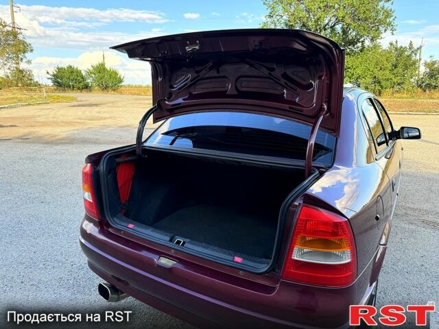 Опель Астра 2006 в Новом Буге на Automoto.ua Красный Опель Астра, объемом двигателя 1.4 л и пробегом 195 тыс. км за 4200 $, фото 9 на Automoto.ua