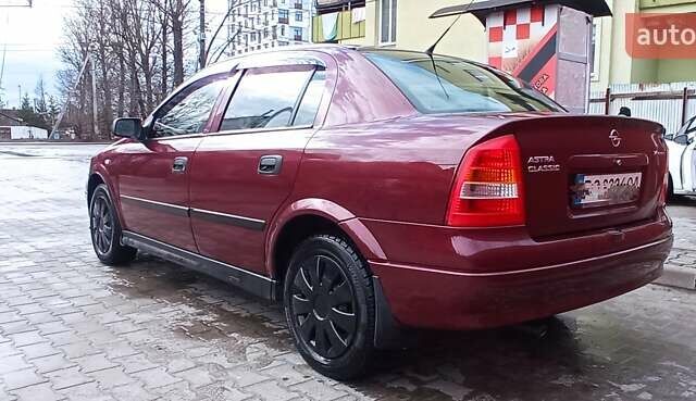 Червоний Опель Астра, об'ємом двигуна 1.4 л та пробігом 207 тис. км за 2500 $, фото 5 на Automoto.ua