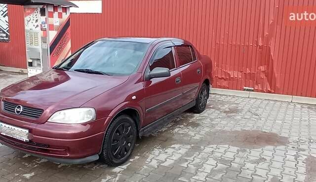 Червоний Опель Астра, об'ємом двигуна 1.4 л та пробігом 207 тис. км за 2500 $, фото 3 на Automoto.ua