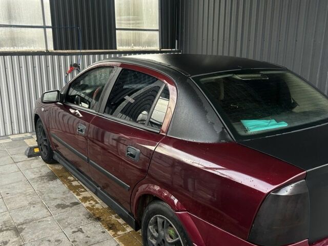 Червоний Опель Астра, об'ємом двигуна 1.4 л та пробігом 300 тис. км за 2600 $, фото 4 на Automoto.ua
