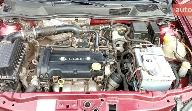 Червоний Опель Астра, об'ємом двигуна 1.4 л та пробігом 207 тис. км за 2500 $, фото 9 на Automoto.ua