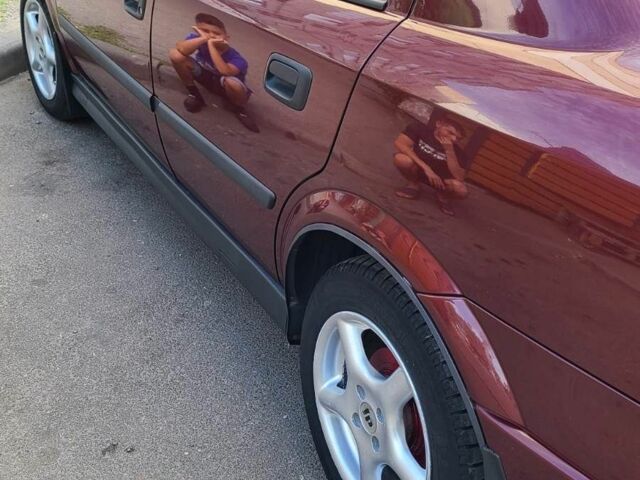 Красный Опель Астра, объемом двигателя 1.4 л и пробегом 226 тыс. км за 4500 $, фото 7 на Automoto.ua