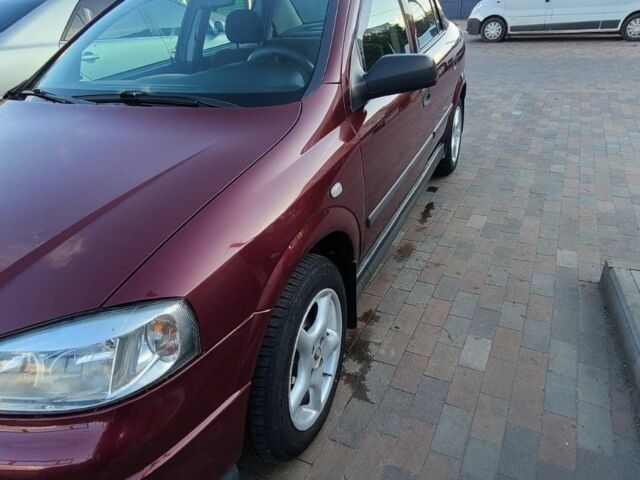 Красный Опель Астра, объемом двигателя 1.4 л и пробегом 226 тыс. км за 4500 $, фото 2 на Automoto.ua