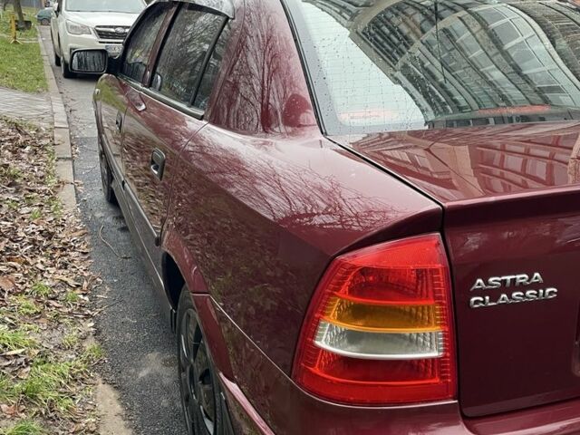Червоний Опель Астра, об'ємом двигуна 1.4 л та пробігом 208 тис. км за 3600 $, фото 4 на Automoto.ua