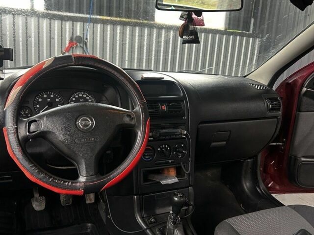 Червоний Опель Астра, об'ємом двигуна 1.4 л та пробігом 300 тис. км за 2600 $, фото 5 на Automoto.ua